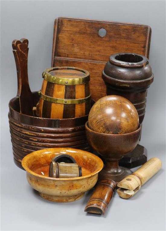 A group of early 19th century and later treen including a luggie, a wall pocket and a mazer